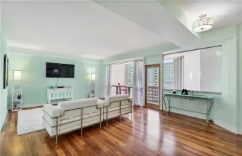 Renovated unit with beautiful wood floors, central air and ocean views.