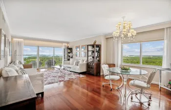 Living / Dining Area with West View, Leading to the Spectacular Wrap Around Balcony for East/South/West & Northern Unobstructive Views.