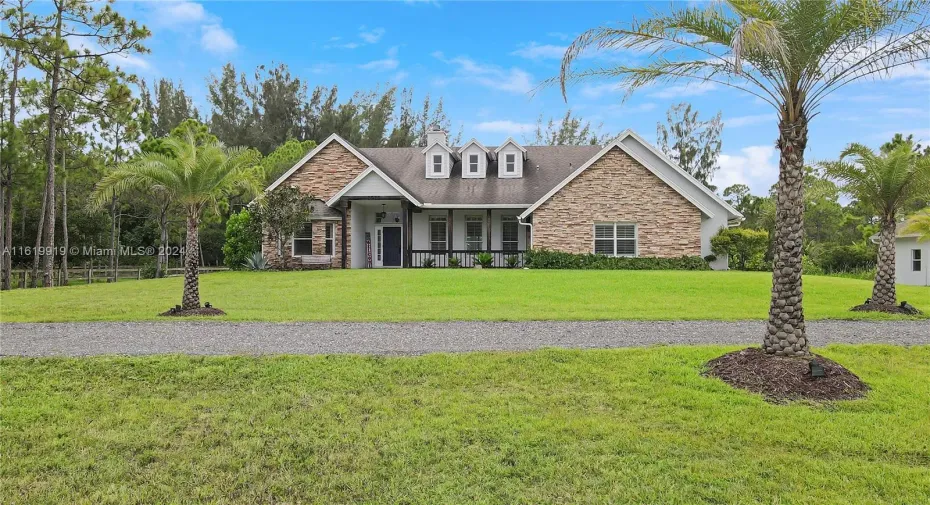 Country style home with great curb appeal welcomes you home