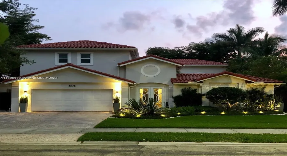 Professionally landscaped front yard