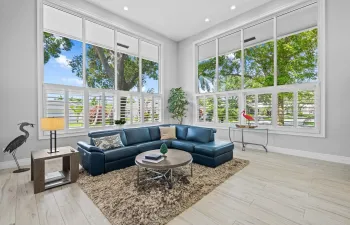 High ceilings and Window wall in formal living room