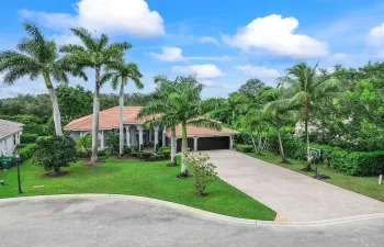 A night time view of sunset skies and new pavered driveway, This 5 bedroom and 3.5 bathroom home is located in a 24/7 guard gated community close to parks and shopping & Great schools