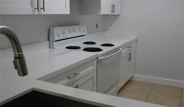 White cabinets/quartz counter