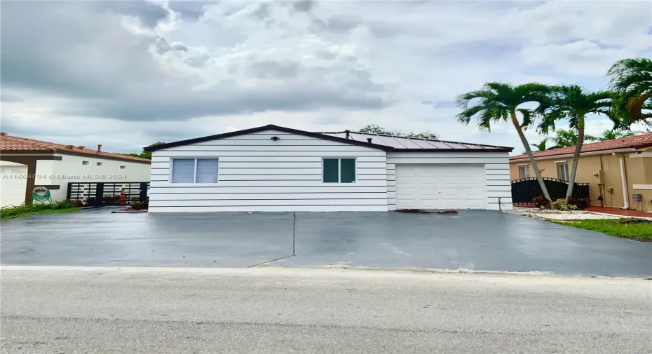 ample driveway for multiple cars