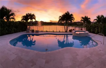 pool, fountain, lake and sunset views