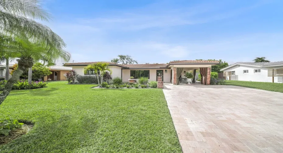 Grass garden in the front  of the home adds charm.