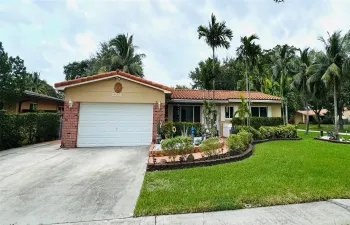 Corner Lot- 3/2 with 2 car garage.